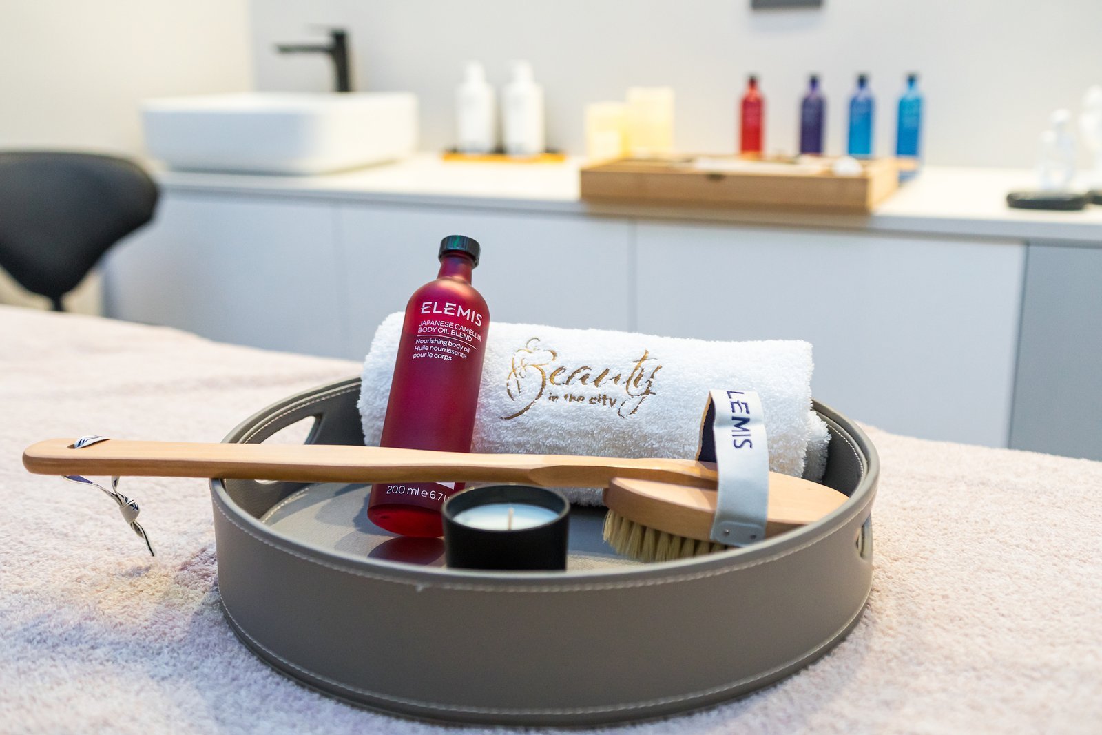 An Elemis massage tray on a Beauty in the City branded towel